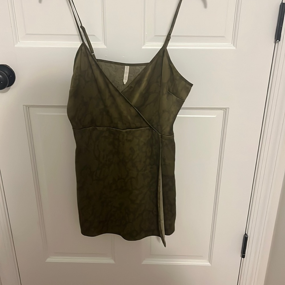 Mini army green romper. Urban Outfitters